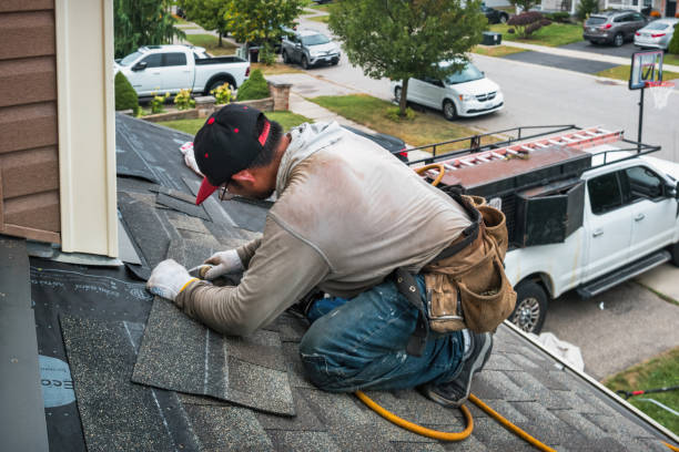 Professional Roofing technician working in College Place, WA